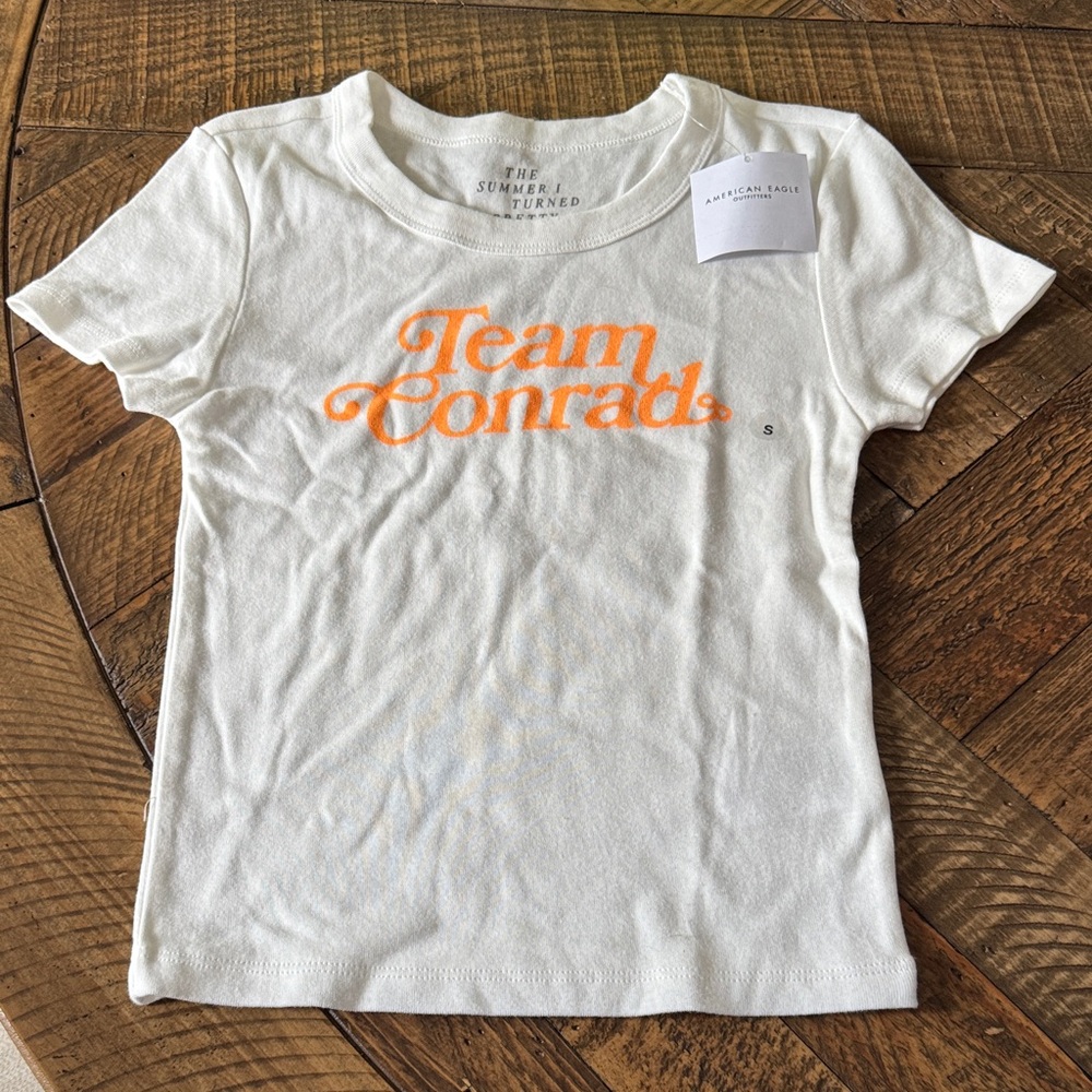 White 'Team Conrad' T-Shirt with Orange Print